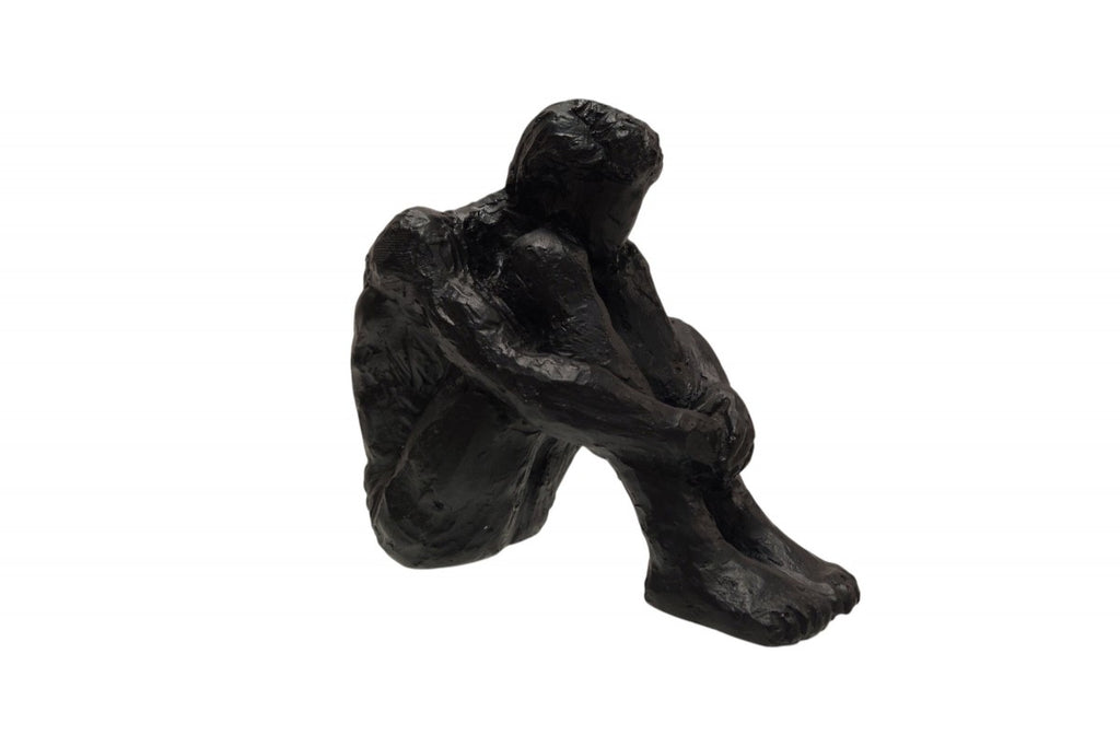 Seated Man Figure